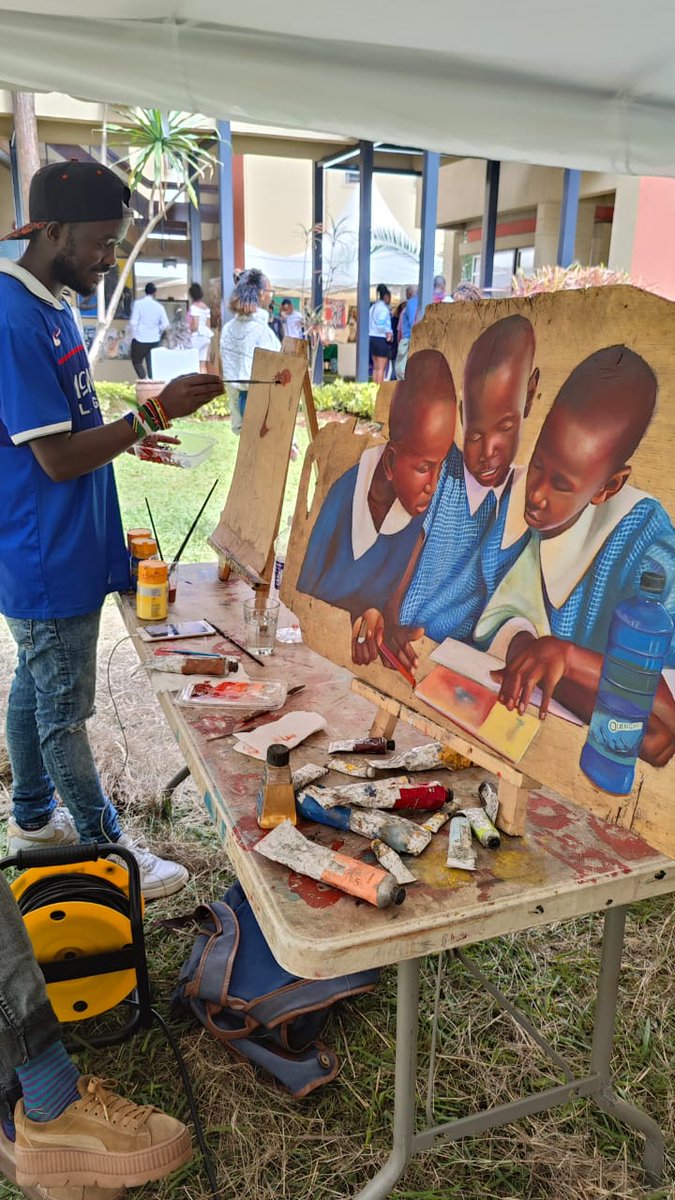 Memories! @Steven_ndavi painting at the #AffordableArtShowKe ... remember when?