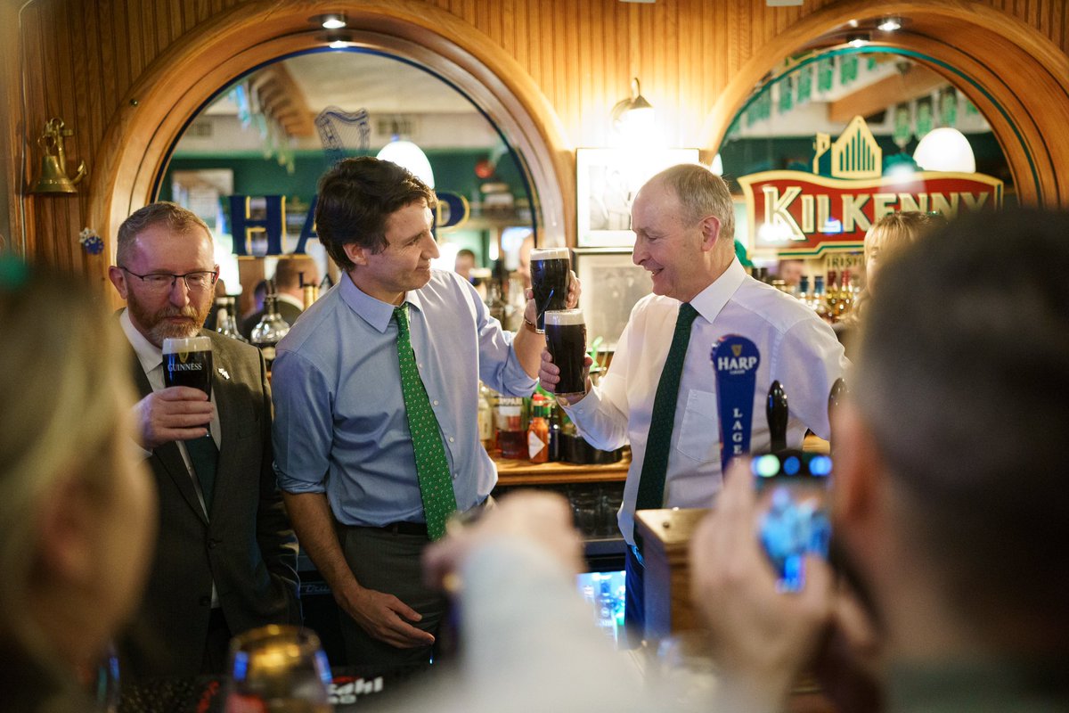 JustinTrudeau's tweet photo. Pulling a pint with the Tánaiste. Cheers to your visit to Canada, @MichealMartinTD — and to the bonds between our two nations. https://t.co/BvRc45IDTN