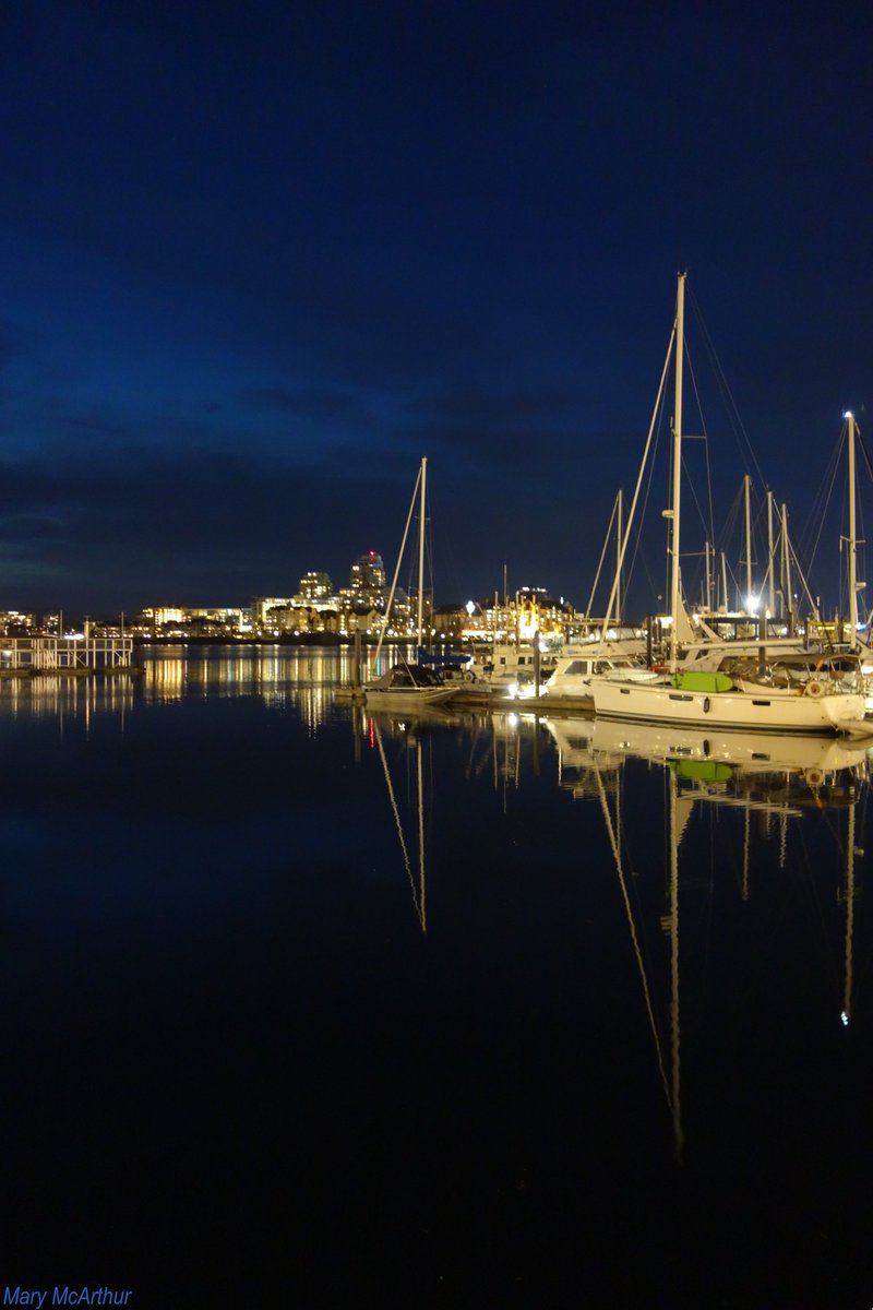 ~ Sailboats reflect in Victoria's inner harbour with the mirroring of city lights in the distance .. 💙⭐️🌟✨~ Victoria, BC ~