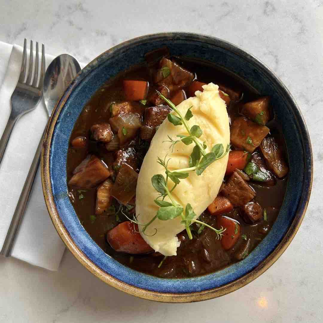 Celebrate St. Patricks Day with a Chef’s Special: Guinness & Beef Stew with Creamy Mash ☘️ #stpatricks #stpatricksday #guinness #stew #mash #titanichotelbelfast #titanic