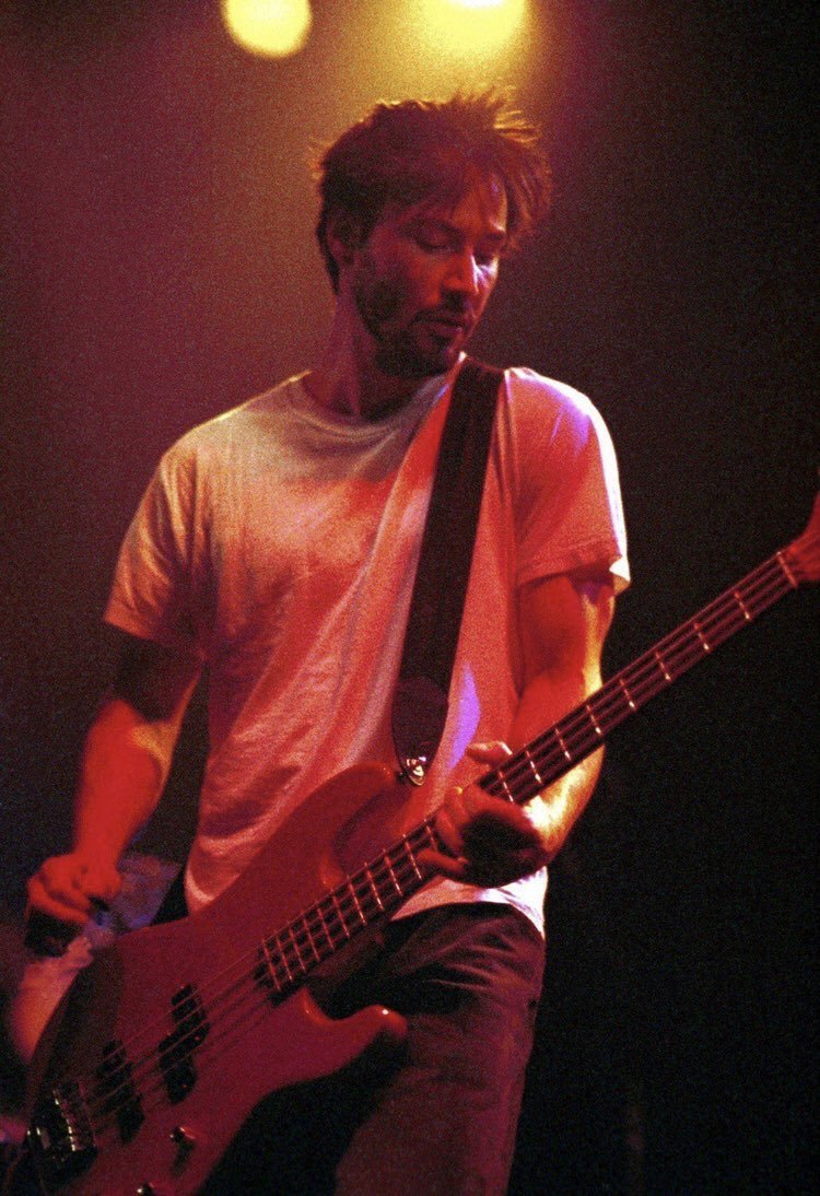 Keanu Reeves playing bass for his band Dogstar, 1996