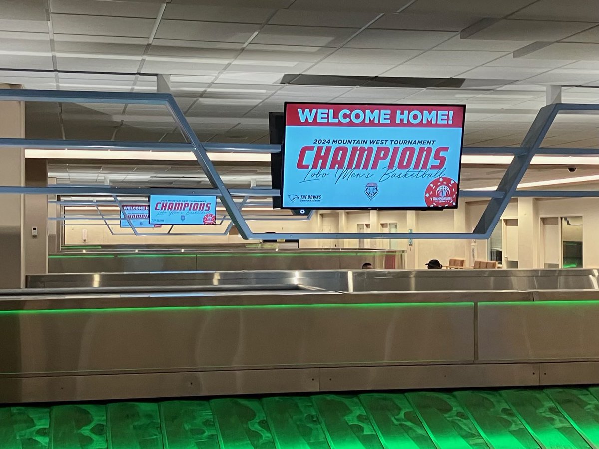 Signs are up! Welcome home, <a href="/MountainWest/">Mountain West</a> CHAMPS!!!! <a href="/UNMLoboMBB/">Lobo Basketball</a>