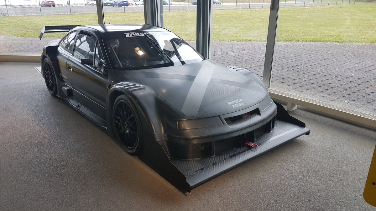 MrCarFacts's tweet photo. Name me a sexier Opel than this Zakspeed Calibra in unpainted Carbon. https://t.co/jU35hZyPkT