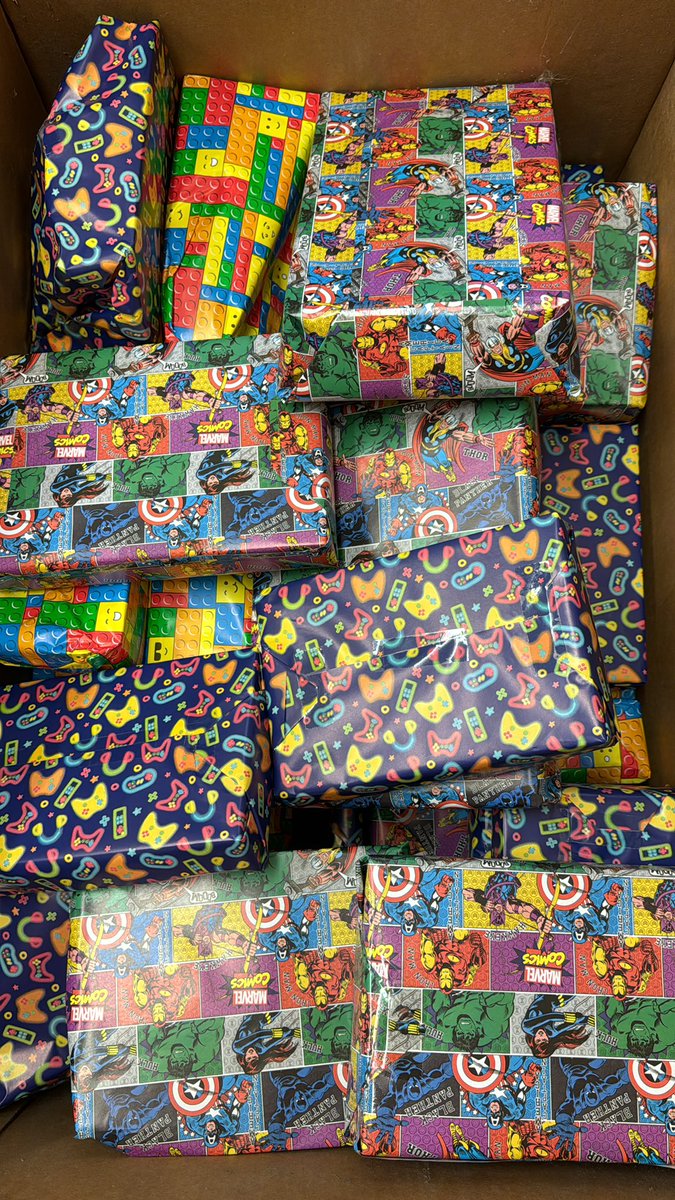 Sunflowerslocal's tweet photo. Some little gifts wrapped and ready today for our Superheroes at the next sleepover. Every child will receive one along with Easter eggs in their rooms on check in. Thank you to our amazing supporters for making this possible 🌻 https://t.co/zObPmPDmLQ