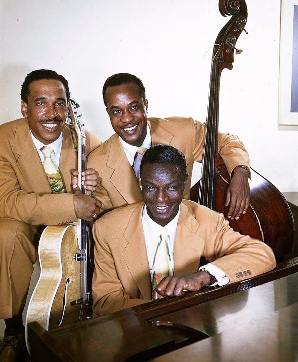 On this day in 1919 #pianist/#vocalist #NatKingCole was born. Nat King is with #OscarMoore on #guitar & #JohnnyMiller on #doublebass. 

#strings #jazzguitarist #bass #cellist #singer #cello #singers #standupbass #uprightbass #jazzvocalist #acousticbass #jazzsinger #jazzsingers