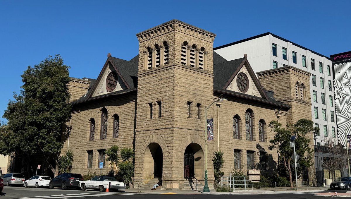 The First Baptist Church was competed before the 1906 earthquake and heavily damaged by it. Julia Morgan led the restoration of the building with its current design.

Would be nice to have the top ornamentation of the towers back!