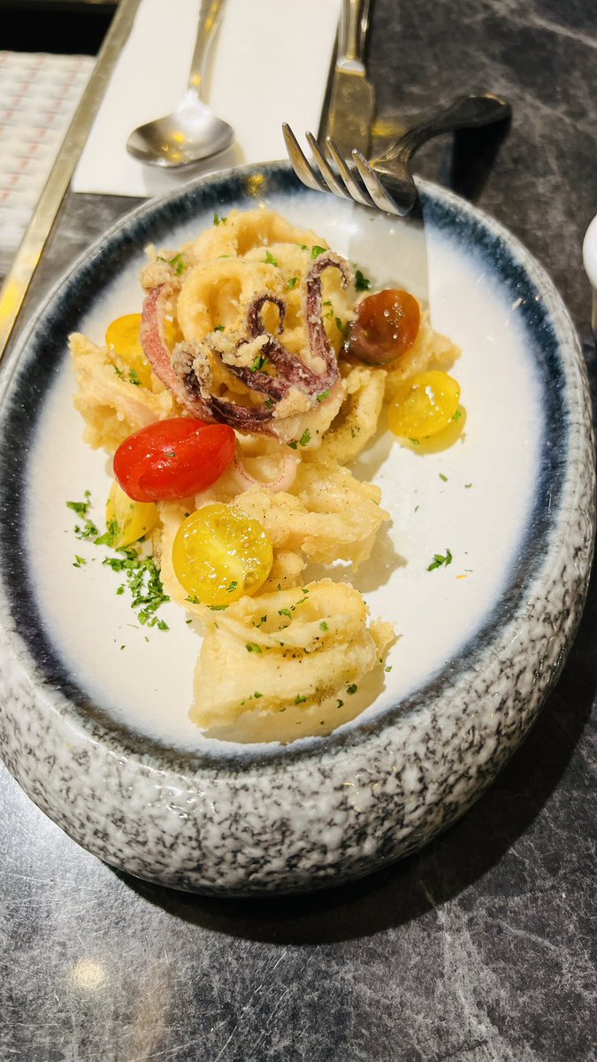 Earning while eating calamari.