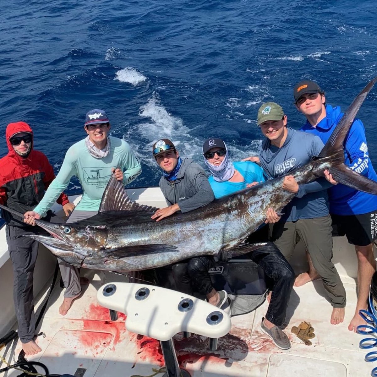 Just a bunch of friends reeling in memories and a massive marlin on our fishing day! 🎣🌊 #BigCatch #FishOn