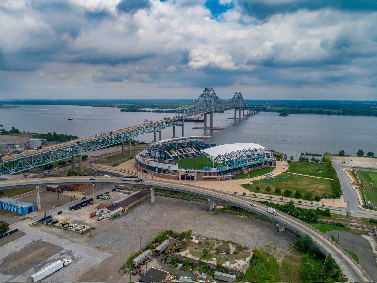 Historynstuff76's tweet photo. The Commodore Barry Bridge the southern most Bridge connecting Chester, PA to South Jersey. From the archives. With the Philadelphia Union Soccer Stadium to the right. #photography #travel #bridges #commutes #explore #stadium #architecture https://t.co/LmTGMcFMBE