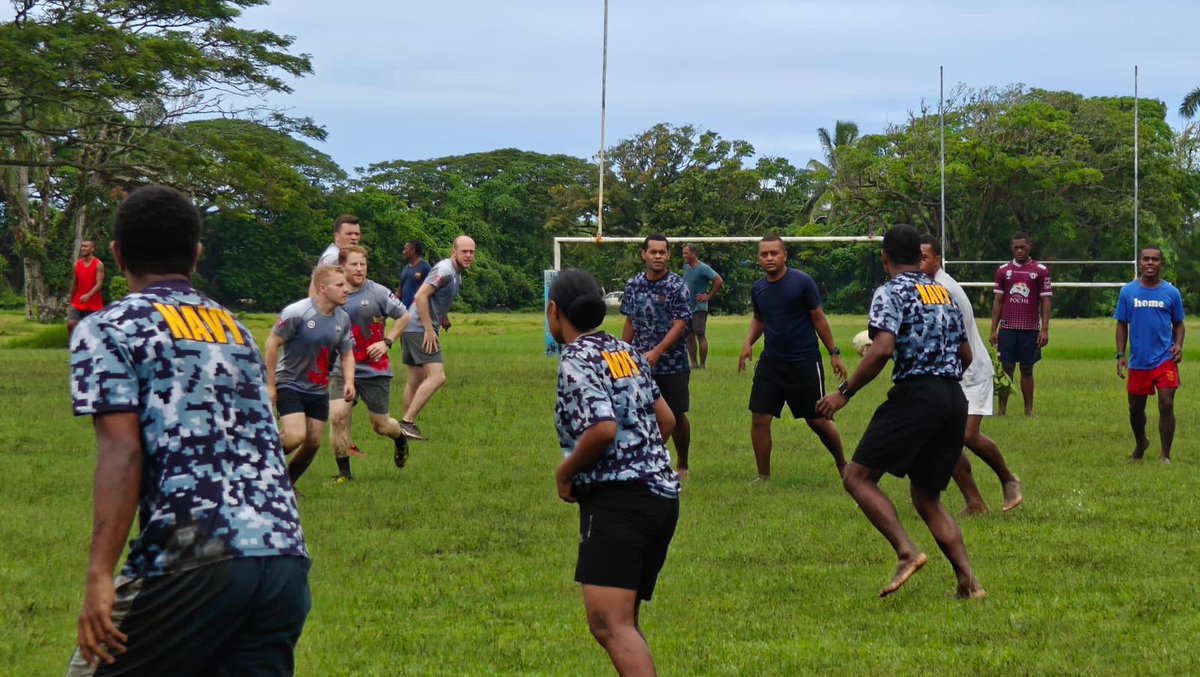 Alongside in Suva, Fiji - Members of ships company participate in a friendly touch rugby tournament against members of the Fijian Navy.