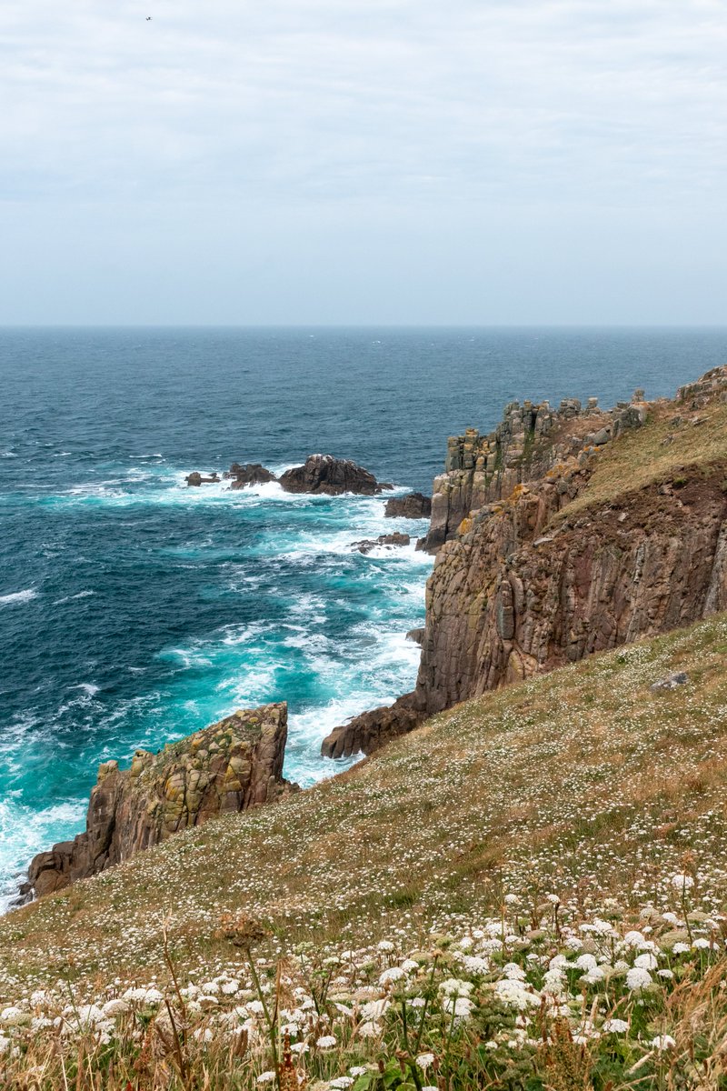 Rugged cliffs and endless horizons... Land's End feels like you're standing at the edge of the world. 🌍 Have any of you made the journey to both here and John o'Groats before? 😅