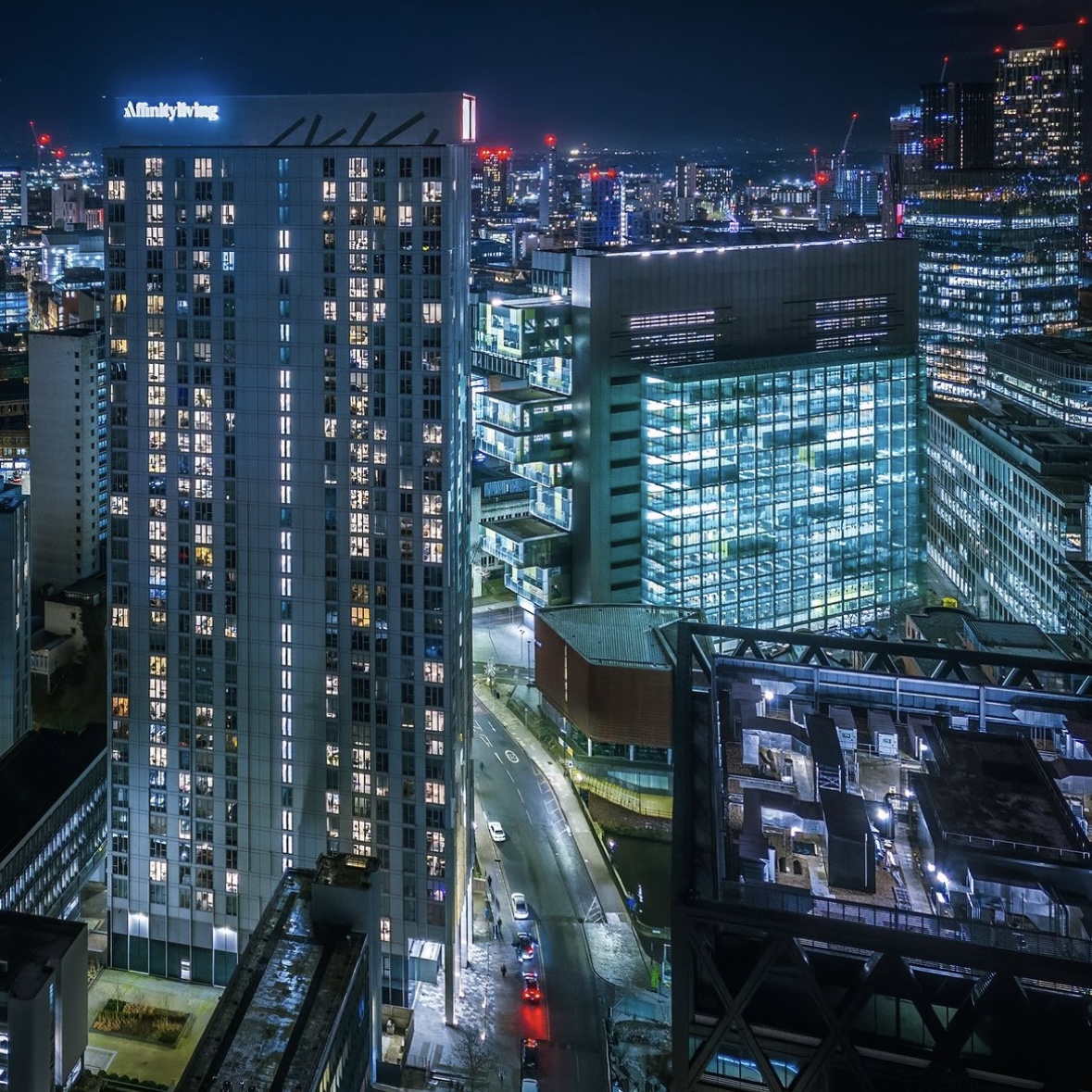 OSelectProperty's tweet photo. Affinity Living Riverview stands at an impressive 33 storeys giving residents some unmatched views across Manchester city centre, Salford and beyond.⁠
⁠
📸 How incredible is this night time capture by local drone pilot @andymallins #SelectProperty https://t.co/r90yTvJMWN