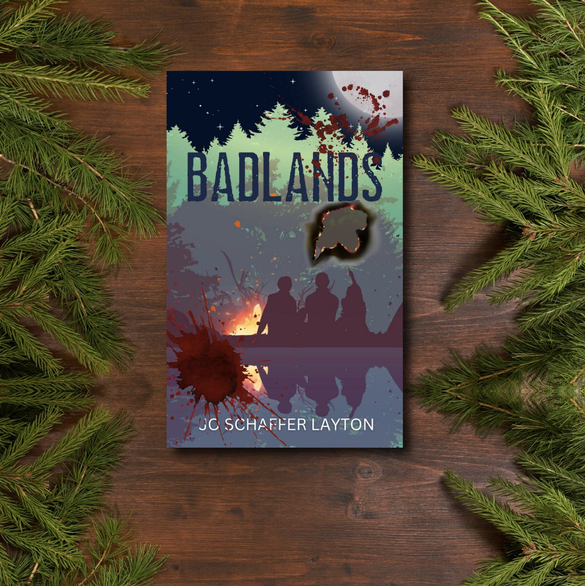 I have just found my next read, and check out that cover! The best part is that it releases TOMORROW (3/18)! This is a YA survival story set in the Idaho wilderness where a killer is on the loose. @owlhollowpress #Badlands #JoSchafferLayton #CoverReveal #YAThriller