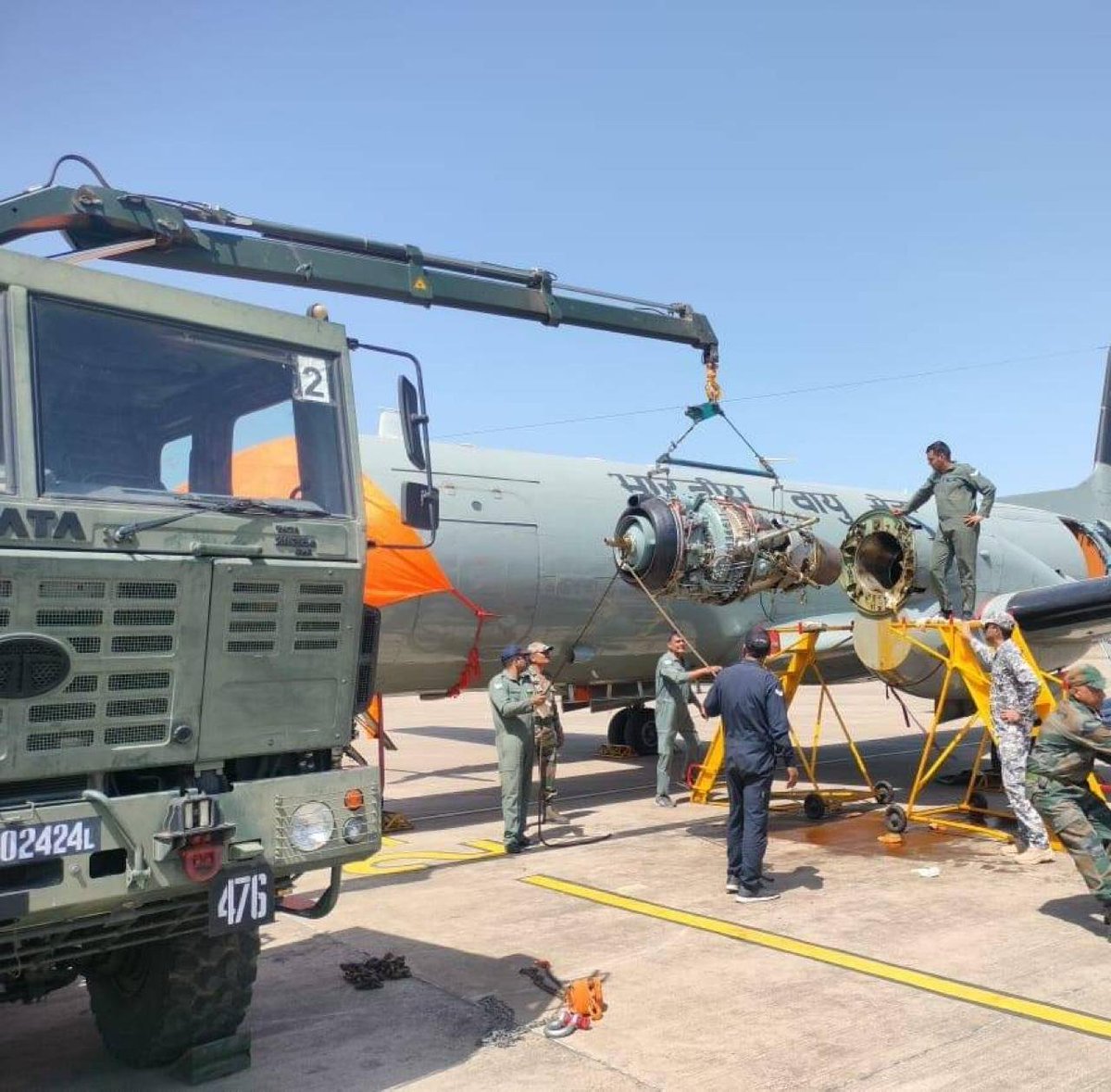 ANI's tweet photo. Following an inflight indication of engine malfunction, an AVRO aircraft had carried out a precautionary landing at the Bhopal civil airport recently. Further analysis revealed the need for an engine change on-site. Displaying jointness, IAF and Indian Army technicians worked seamlessly to ensure the same, in spite of limited technical support at site: IAF