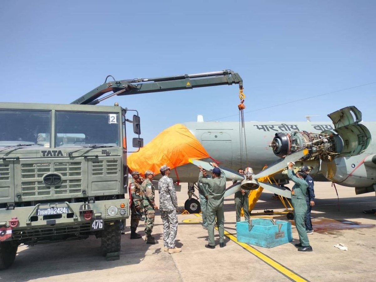 ANI's tweet photo. Following an inflight indication of engine malfunction, an AVRO aircraft had carried out a precautionary landing at the Bhopal civil airport recently. Further analysis revealed the need for an engine change on-site. Displaying jointness, IAF and Indian Army technicians worked seamlessly to ensure the same, in spite of limited technical support at site: IAF
