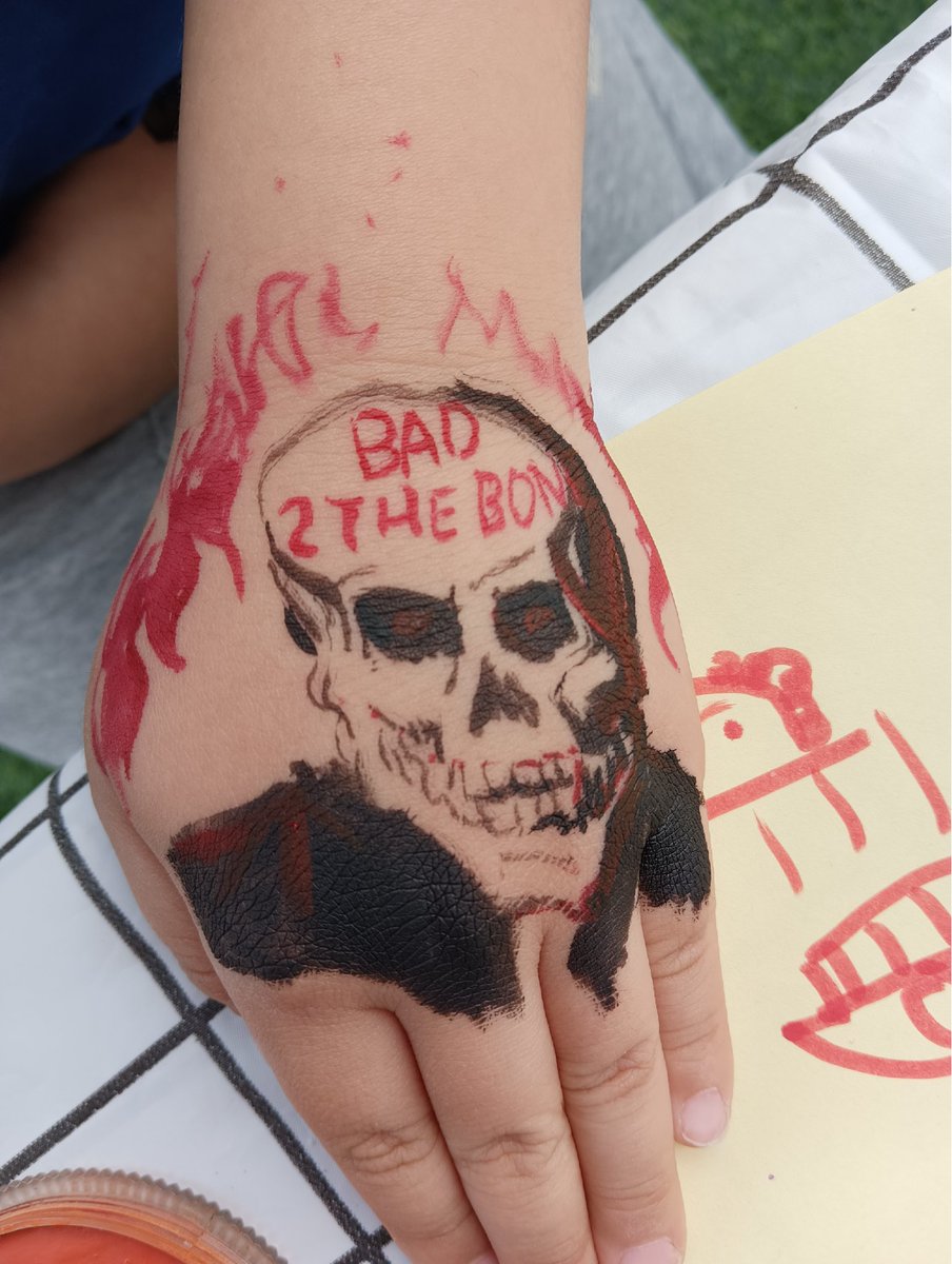 I was doing face painting at a school event and a boy asked for a zombie, so I pretended not to know what a zombie was as an excuse to draw this