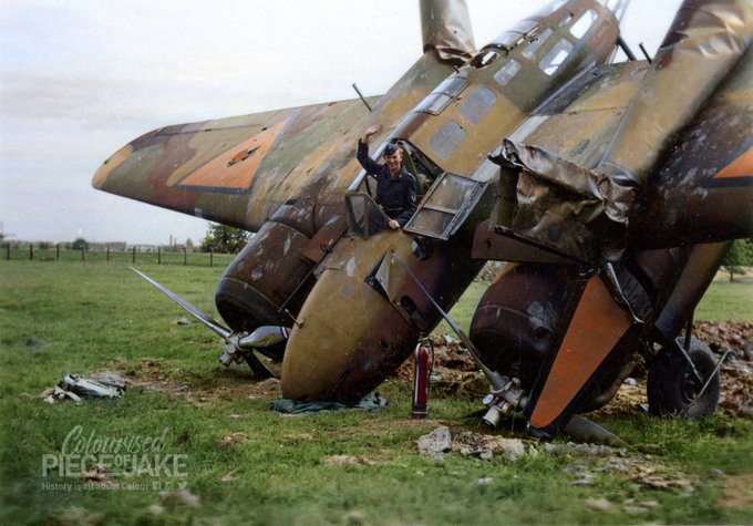 A destroyed Dutch Fokker G1 after being bombed by the Luftwaffe in May 1940 during the German invasion of the Netherlands. Shown here at Waalhaven Airfield, Rotterdam. Colorised by Jake. Original in tweet 2.