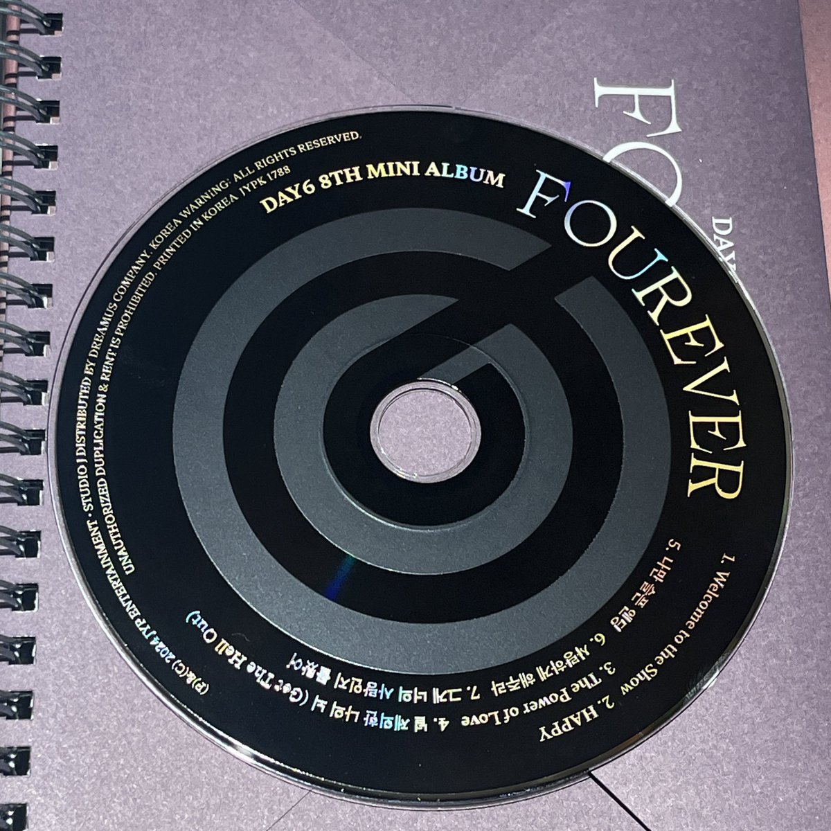 Fourever cd has Day6 logo on it 😭😭