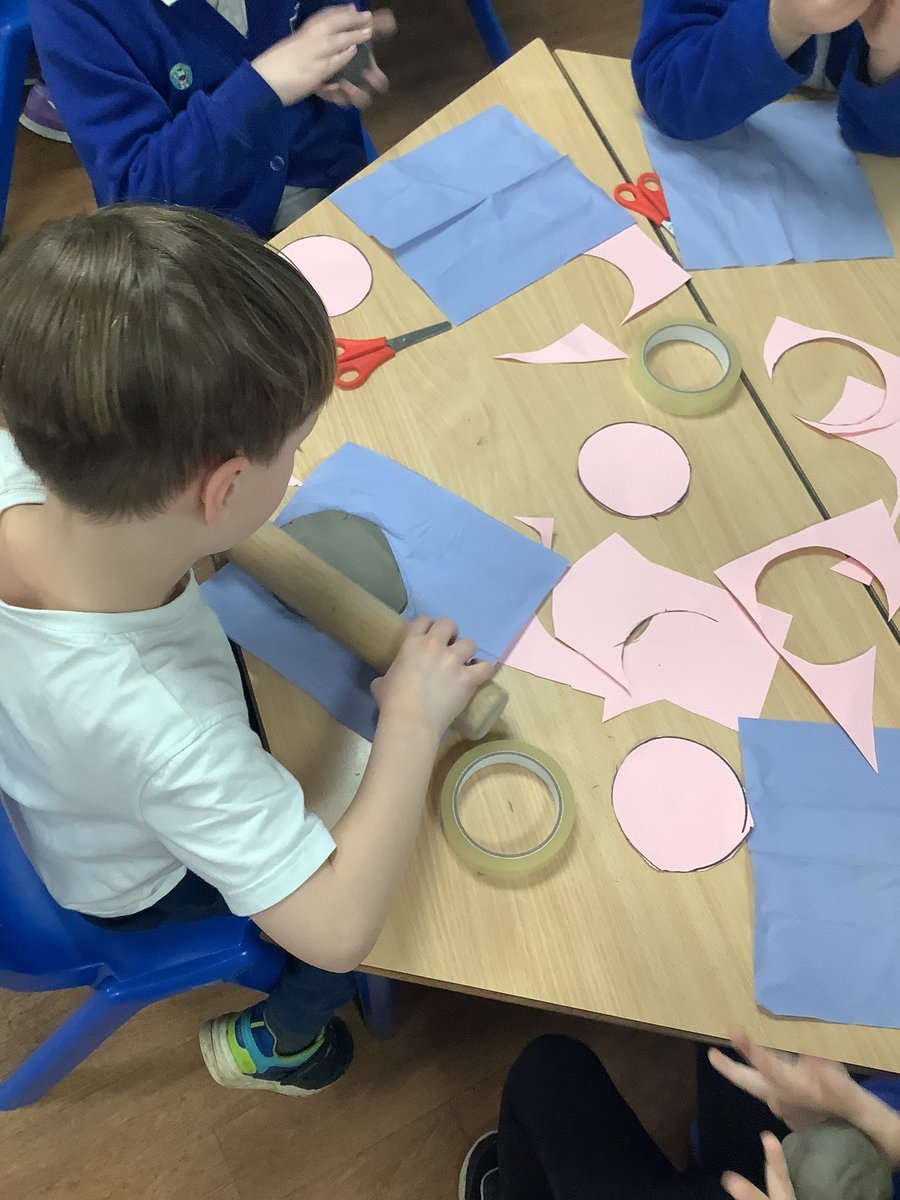 st_michaels_ham's tweet photo. Next we made stencils and cut our bases. It was lovely to see the children help one another. Step one complete! 👏😄#CLAYCLUB #SMITHArt #KS1 https://t.co/UvY92CgtPY