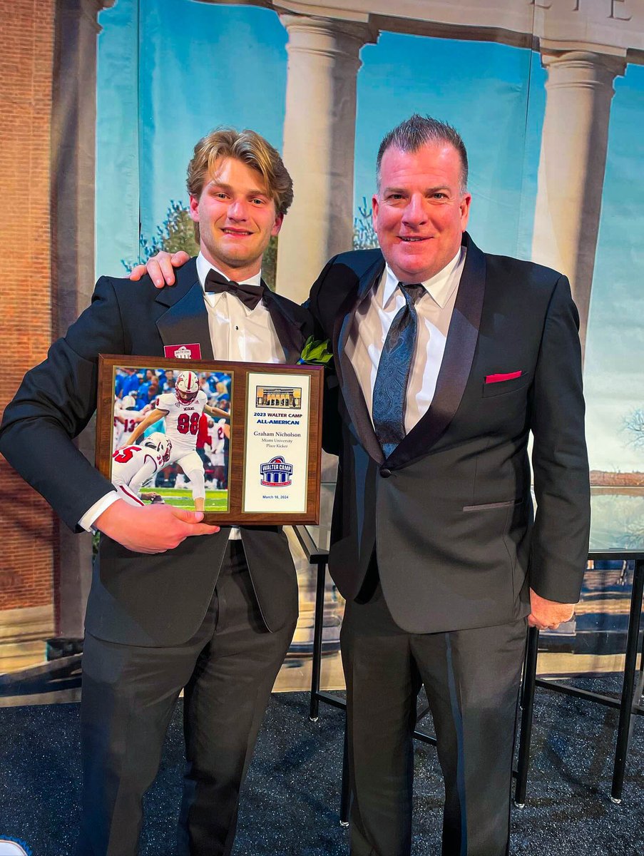 Last weekend Graham Nicholson and Coach Martin attended the Walter Camp All-American Dinner where Graham was honored as a First Team All-American‼️ #RiseUpRedHawks | 🏆🎓