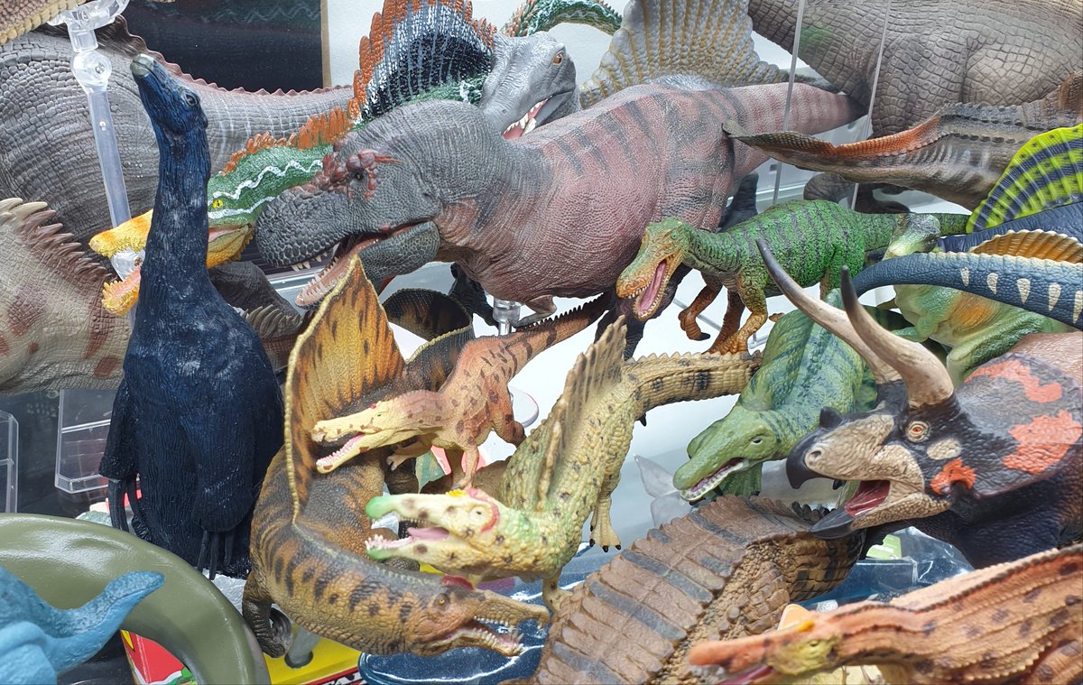 TetZoo's tweet photo. The spinosaur shelf has been partly rearranged, but now also includes the Rebor T. rex and the #AllYesterdays figures released by @splendidhand https://t.co/wyVv11aTTi