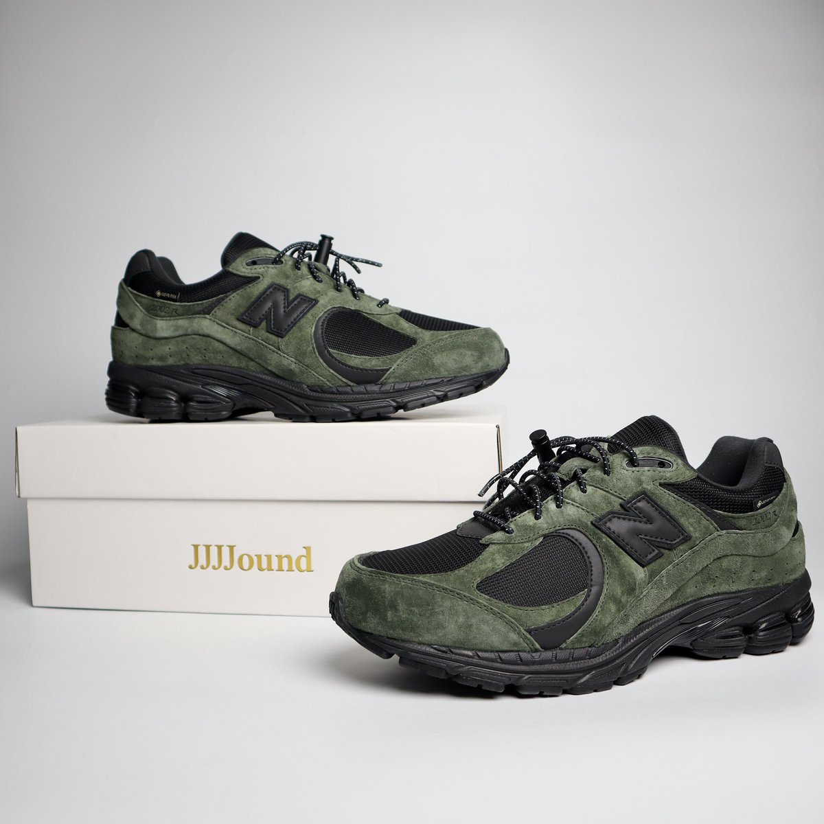 Detailed look of the JJJJound x New Balance 2002R Gore Tex 'Pine
