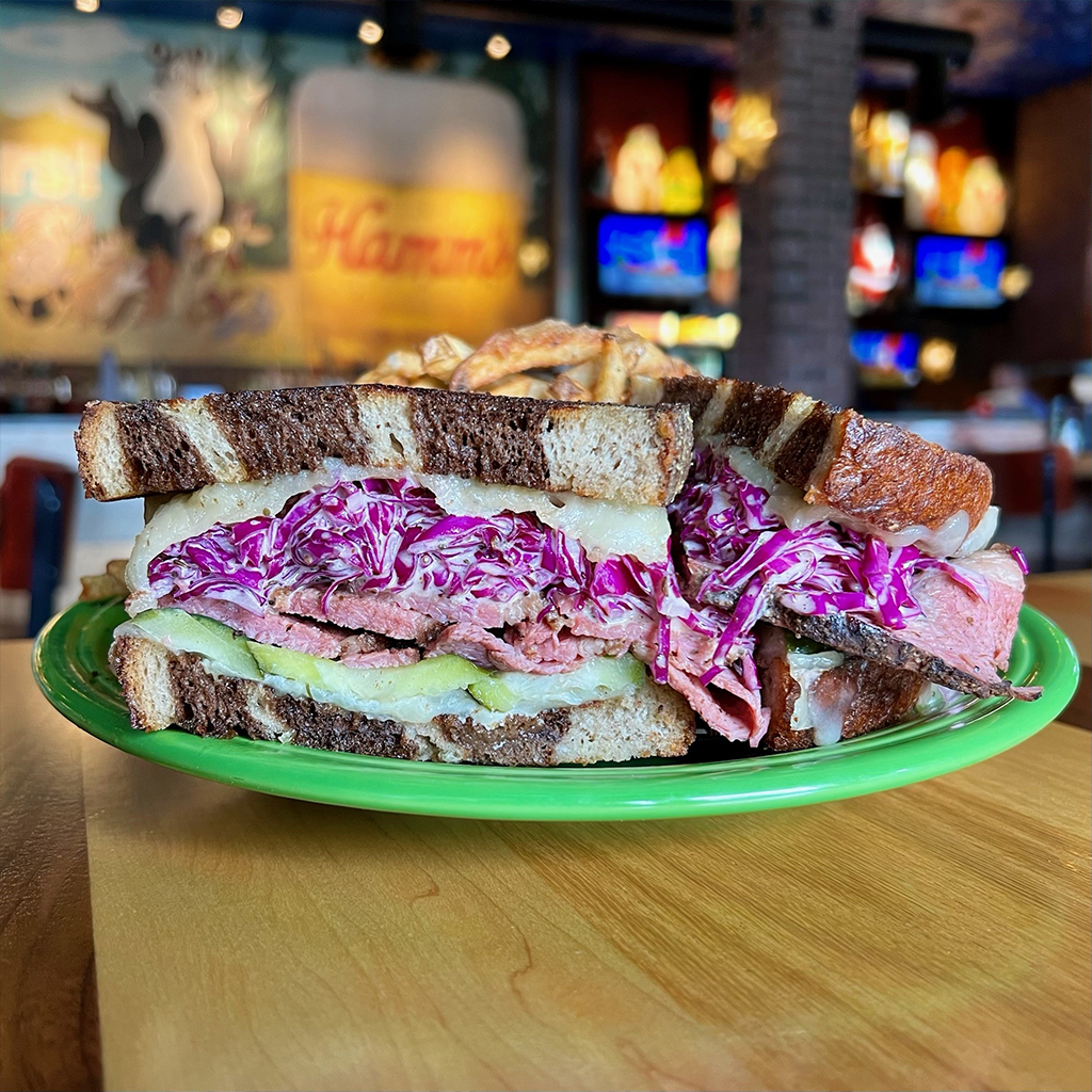 New sandwich alert!! 🥪🎉 Introducing Pappa’s Purple Pastrami. Tender pastrami, crisp purple cabbage slaw, tangy house-made pickles, melty Swiss cheese, and more! Available as a sandwich or wrap! Order for pick-up, delivery or dine-in today. bit.ly/3TfxKMa