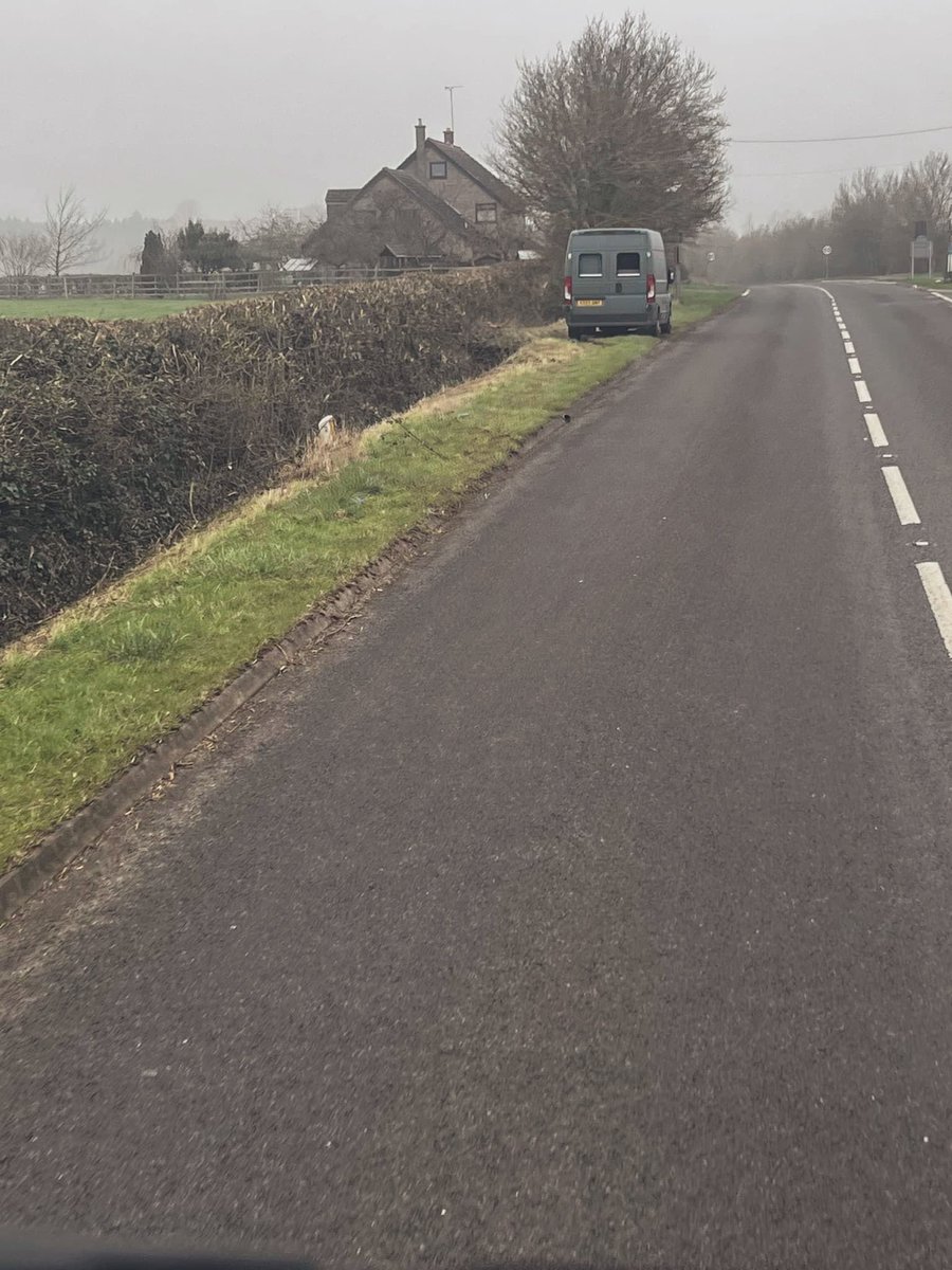 If this was a contractor working on the road there would be a legal requirement to have amber flashing lights for safety.