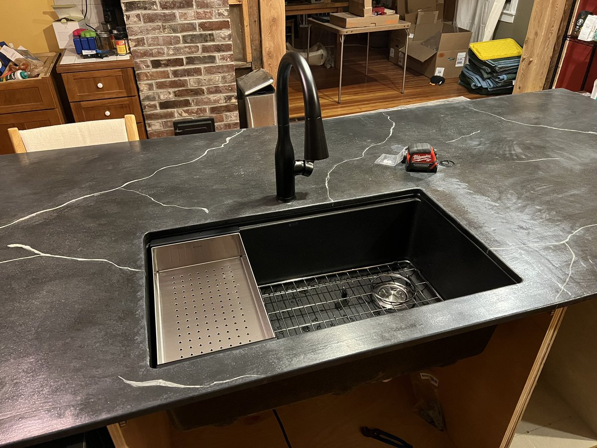 TimothyBausch's tweet image. We are so excited to share photos of our kitchen renovation! This house didn’t come with a kitchen so we decided to focus on the island first. We built our own cabinetry, painted a plywood countertop (my partner is amazing), and ran all the water/electric ourselves 😍 #sohappy