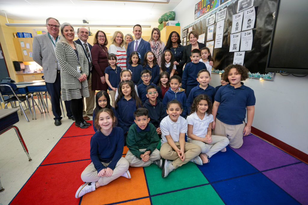 Governor Healey and children in classroom.