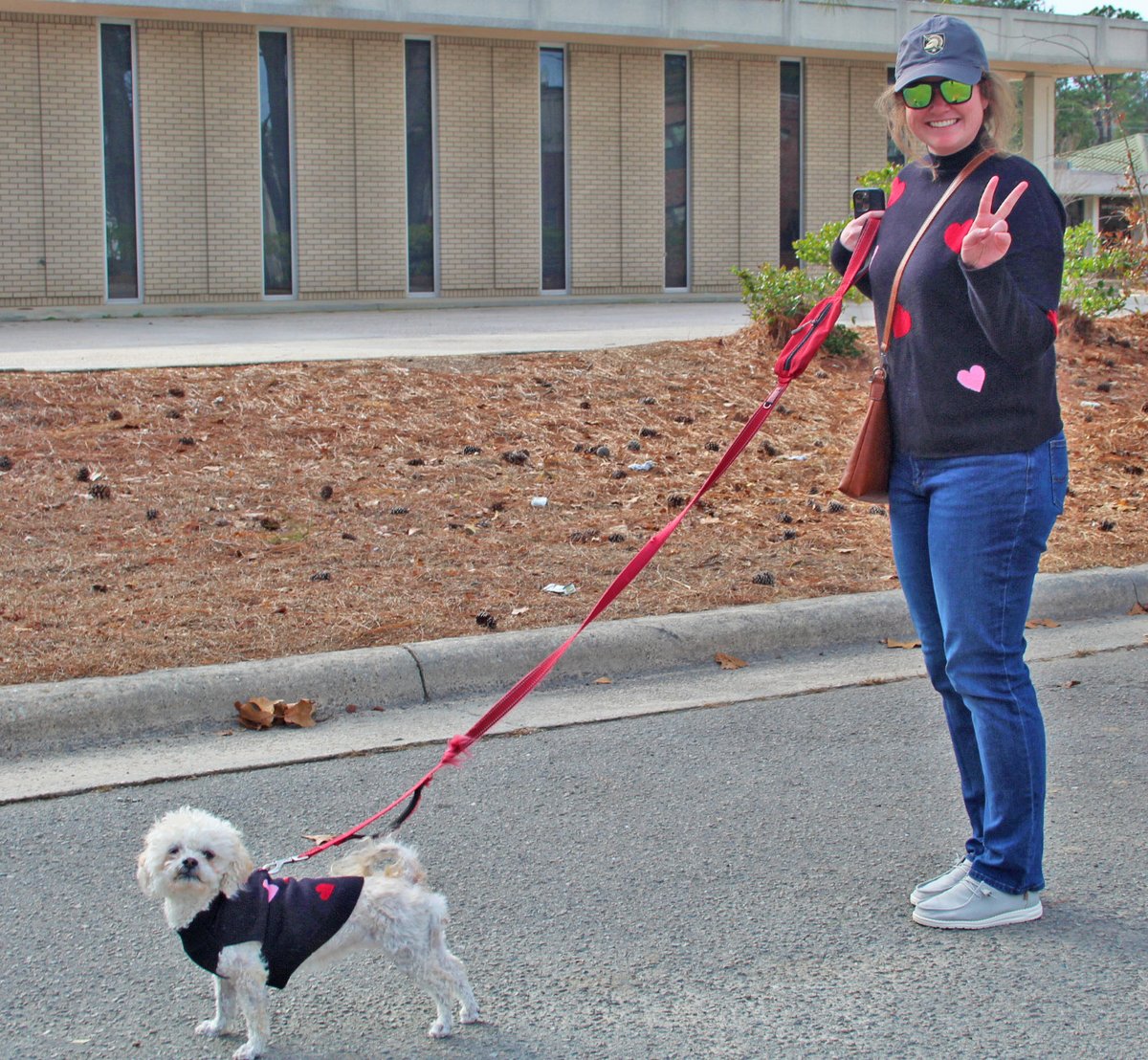 Tori Hypes and her #dog, Leia, taking a stroll in #SouthernPines.

Photo By: Joseph Hill🙂📸🐶