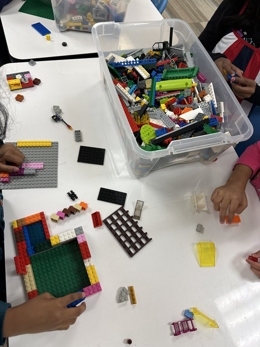 Kinders are just the best. This group of girls just put their hands together, “3, 2, 1 Girl Power!!!”  They are building a house today.