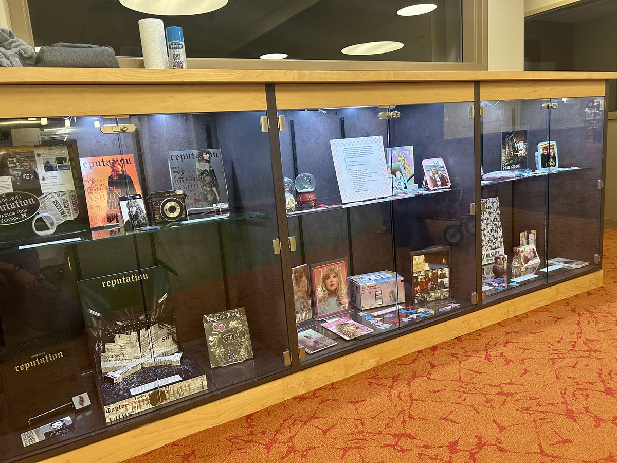 jgritz78's tweet photo. Honored to be displaying some of my @taylorswift13 memorabilia spanning all of her eras at @homerlibrary Stop in and check out everything from Keds shoes to greeting cards and perfumes by Taylor Swift. @taylornation13 #taylorswift #Swifties https://t.co/IjReXfldiq