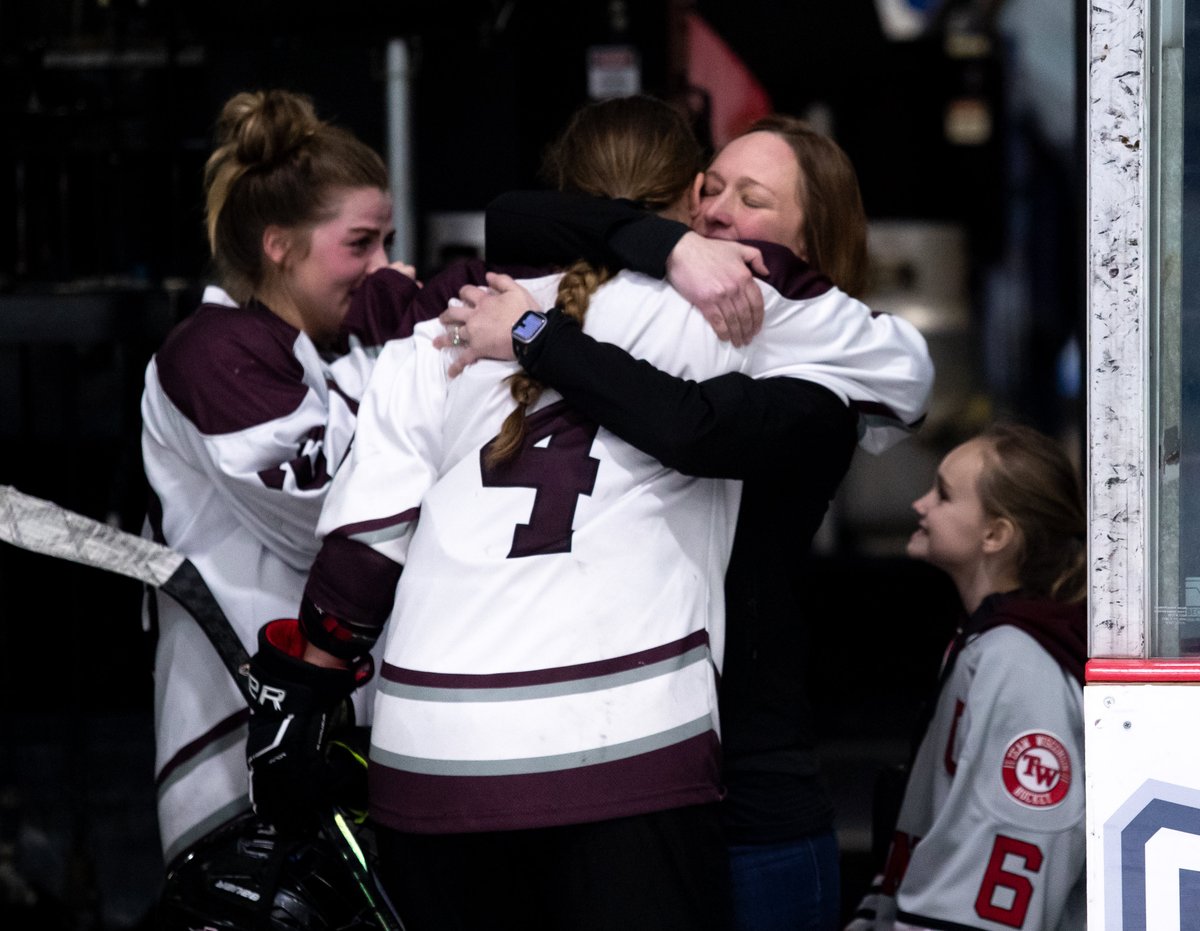 Senior captains Madi DePuydt and Tristan Wicklund leave the ice for the last time Saturday as State Champions, into the arms of their coach.