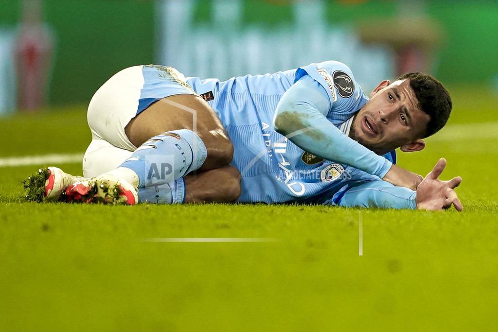 Manchester City’s Matheus Nunes lies on the ground during a Champions League round of sixteen second leg soccer match between Manchester City and Copenhagen, at the Etihad Stadium in Manchester, England, Wednesday, March 6, 2024. (AP Photo/Dave Thompson) Ouch!!!!!