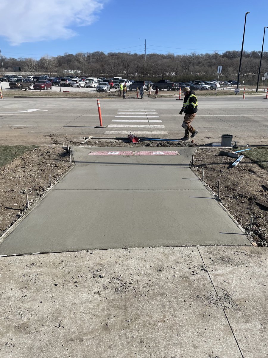 WaldronKC's tweet photo. Our ⁦@KansasCity⁩ Public Works crews and contractors out hustling to improve the pedestrian paths on Berkley Parkway and in River Market in preparation for next Saturday’s first ⁦⁦@thekccurrent⁩ CPKC stadium game. #TealRising https://t.co/bKtEC19UNd