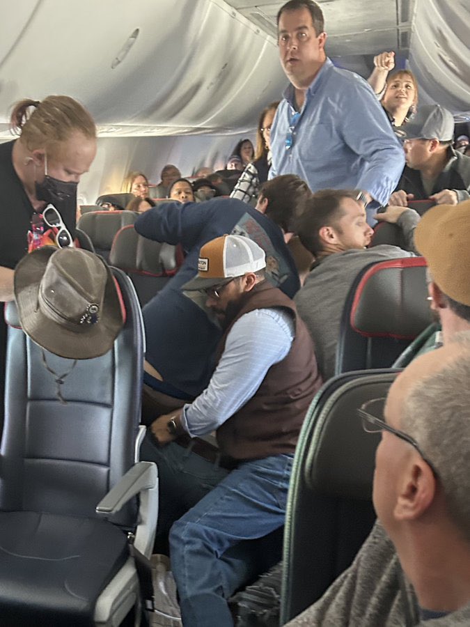 FeitsBarstool's tweet image. This guy on my flight wouldn’t stop chanting about LinkIn while trying to open the door but luckily we got him down. Everyone is chanting #klemmer now and is very happy.