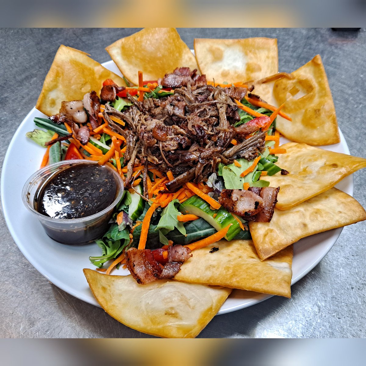 Weekly Food Special - Smoked Beef Ponzu Salad! 
House-smoked beef, #bacon, scratch-made ponzu dressing, red bell pepper, cucumber, carrot, red onion, mixed greens, and flour tortilla crisps.
#BrewedOnBase #Indianapolis #FtBenIN #WhyILoveLawrence  #seektheseal #Foodporn #Foodie