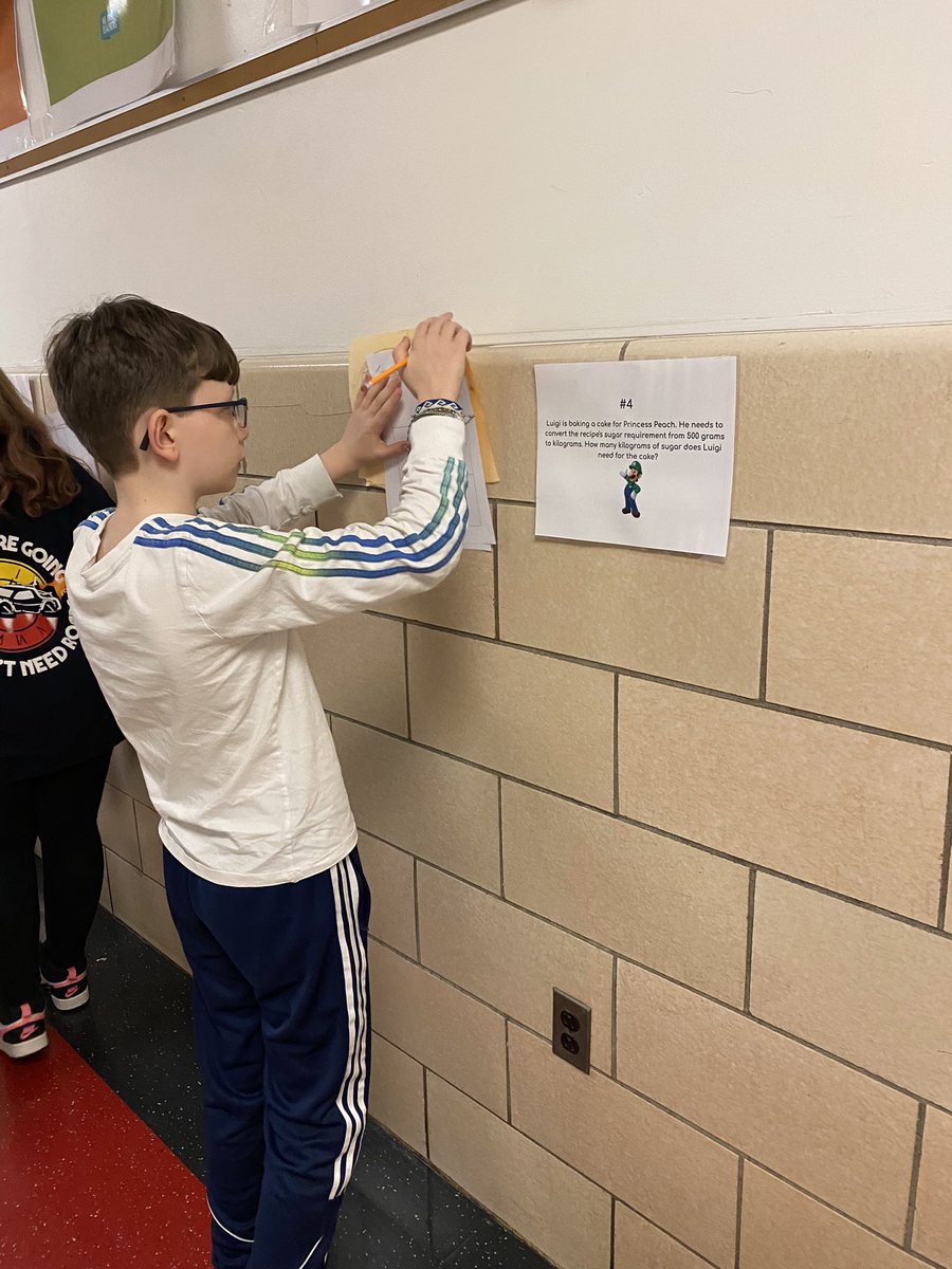 MrsTerrillion's tweet photo. Today we had math outside of the classroom! We took a math gallery walk to solve word problems with converting customary and metric units. @IslandtreesMMS https://t.co/9KccI8Ldjs