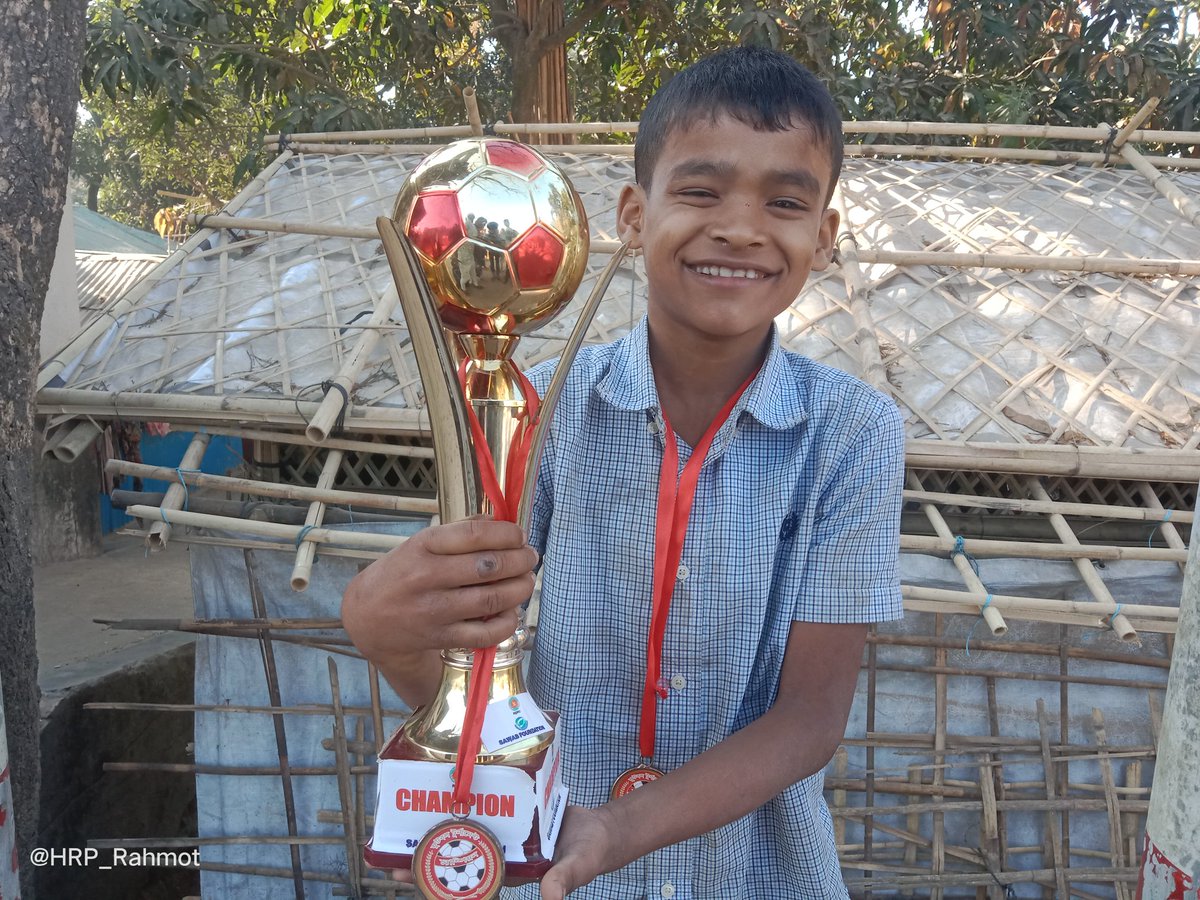 A Rohingya little boy, he is very happy today with football cup refugees Camp in Bangladesh, His name is Anamul Hoque 📸 @HRP_Rahmot