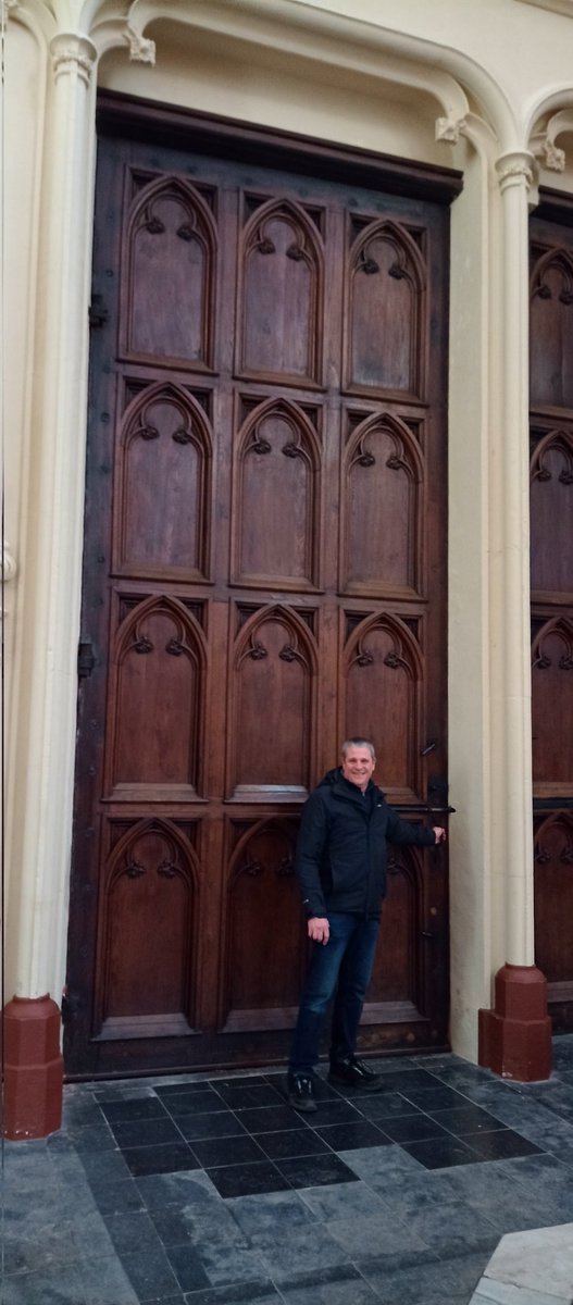 A big door in Bruges (husband for scale) #adoorablethursday