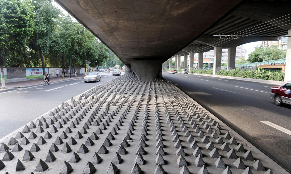 creepydotorg's tweet image. "Anti-homeless spikes" to prevent the underprivileged from having a place to sit/sleep.