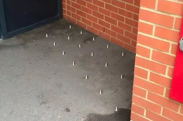creepydotorg's tweet image. "Anti-homeless spikes" to prevent the underprivileged from having a place to sit/sleep.