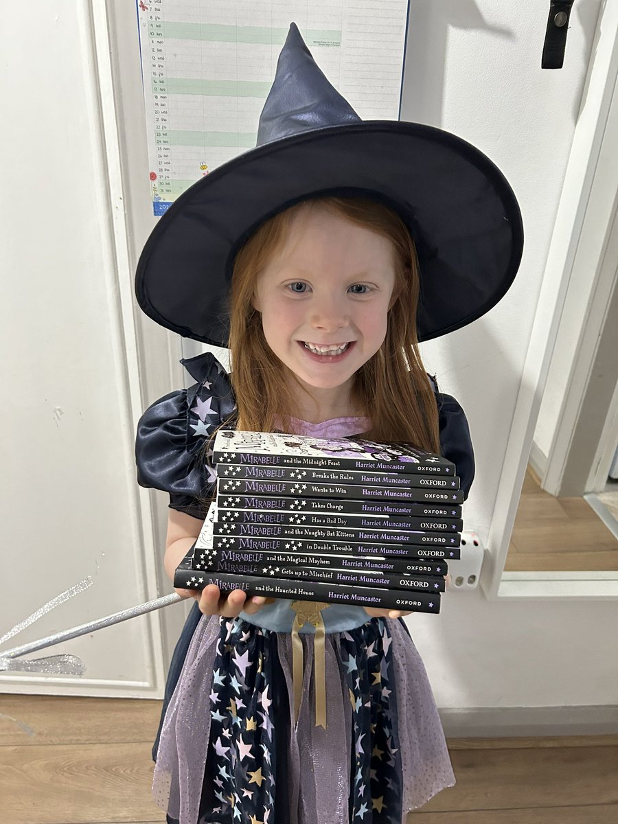 Of course Mollie wanted to be #MirabelleStarspell again for #WorldBookDay here she is flexing her fave series of books by the amazing @H_Muncaster 💜🖤