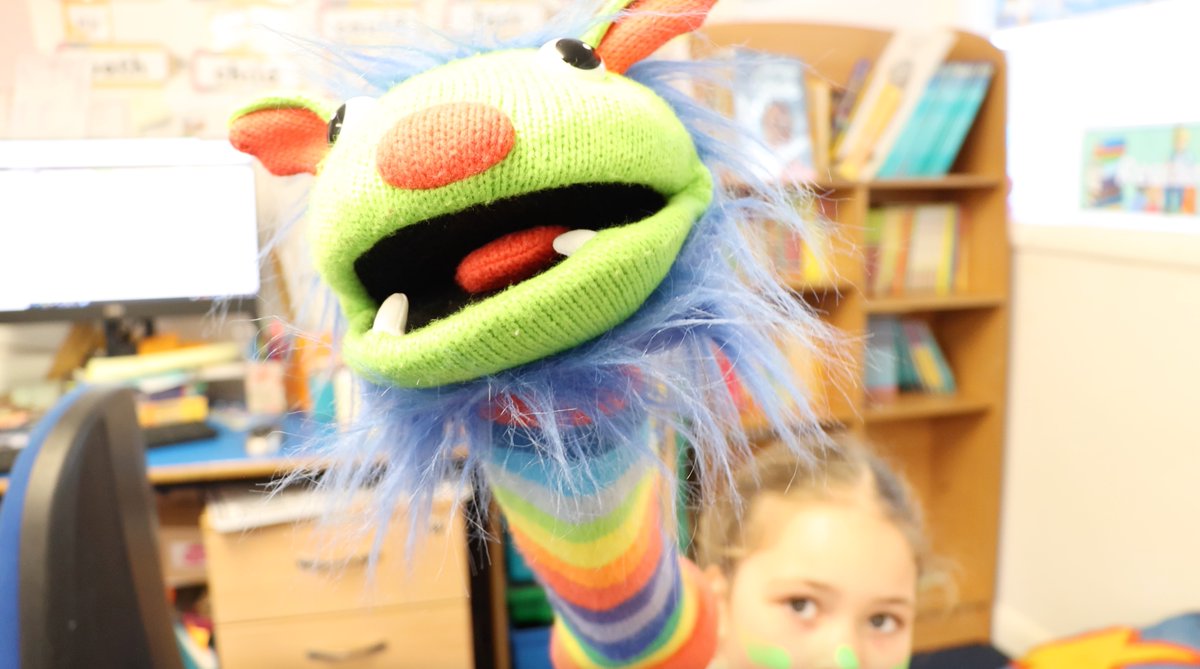 This afternoon, we spotted five green monsters at St. John's Cathedral Catholic Primary School! 🖐🎶 Stay tuned for the upcoming video to catch all the fun!