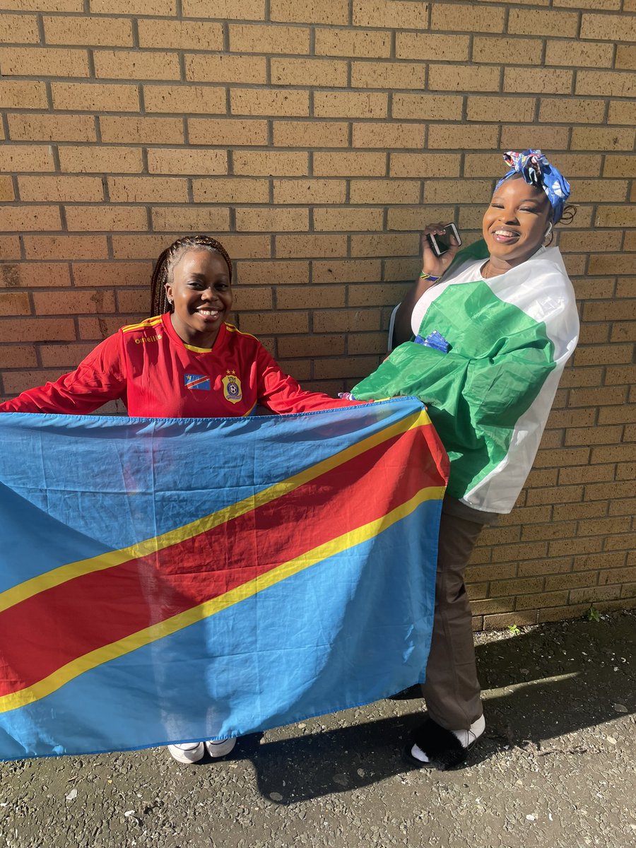 RosshallAcademy's tweet photo. Toby and Theresa bringing the sunshine today - flying the flag for the Democratic Republic of Congo and Nigeria 🩵❤️💛💚🤍💚 https://t.co/artym2uLNS