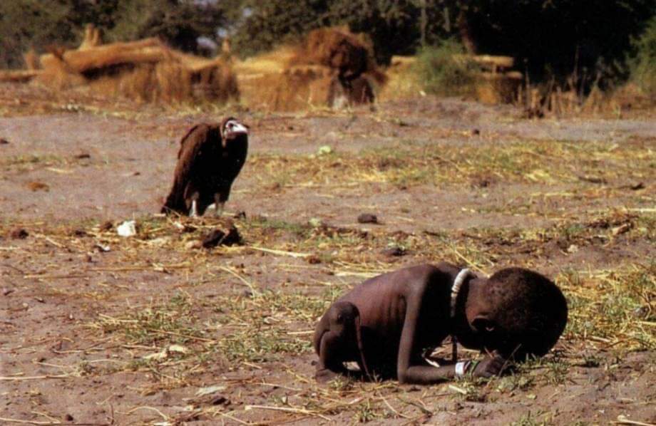 In 1993, Kevin Carter, a South African photojournalist on a photo shoot the famine in Sudan. He came across a starving child resting on its way to a UN food distribution centre. His image of 'a collapsed child, with a vulture stalking over her, waiting for it's moment of
