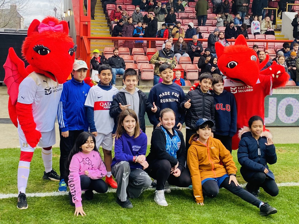 In February for our home fixture vs Burton we welcomed pupils from @Greenleafe17 to celebrate #WorldBookDay . Pupils took part in a pre game Education Workshop, were pre match flag bearers & took part in a half time penalty shootout! #PLPrimaryStars 😀📚