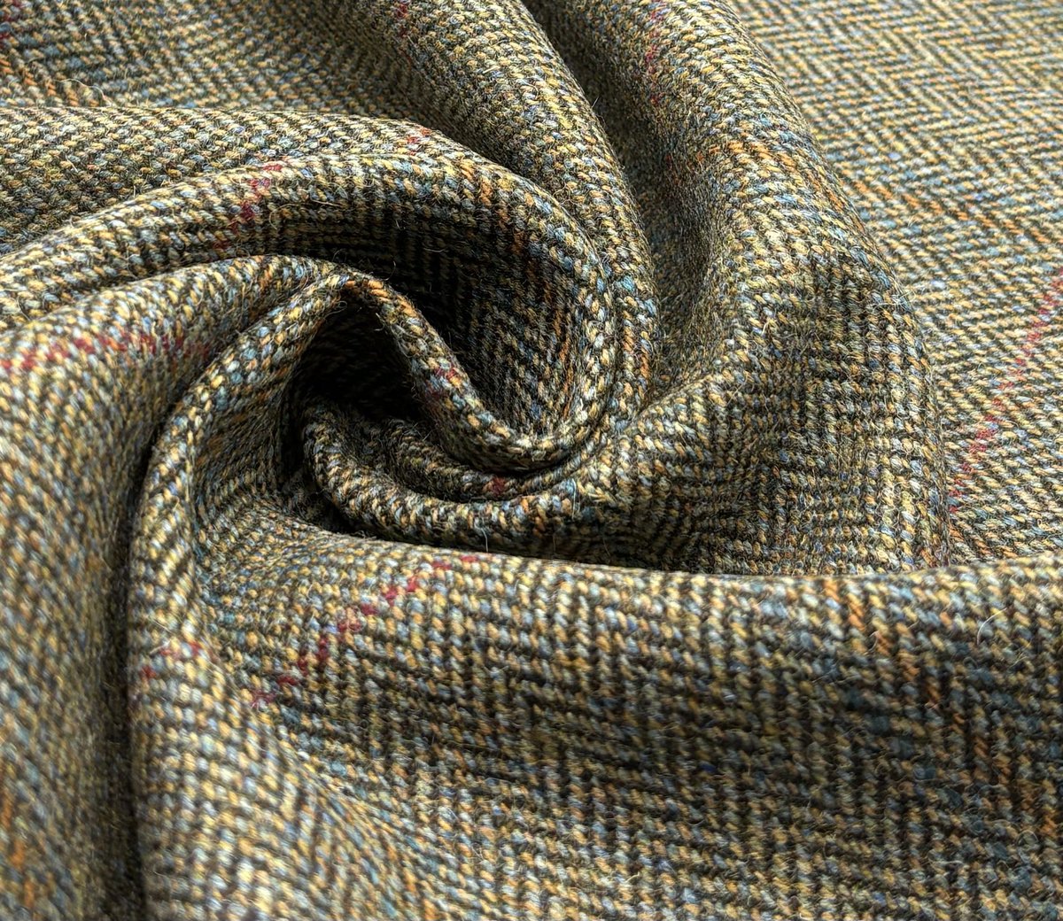 New arrival 😁😁 beautiful green / blue herringbone with a yellow check design. Made from luxury tweed wool fabric. Online at kabbanitextiles.com #madeinengland #tweed #wool #upholstery #hunting #countryside #herringbone #jacketing