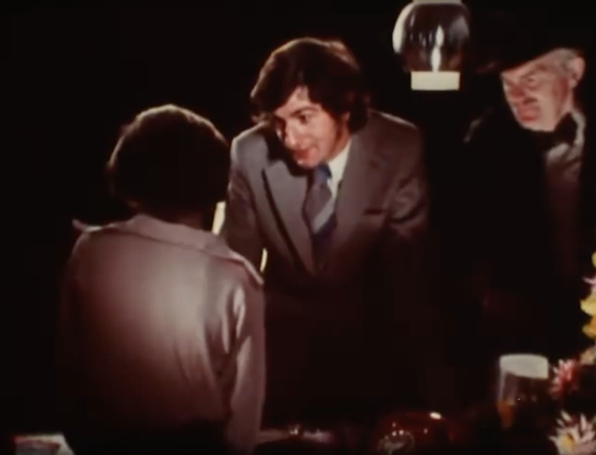 Just found this: young student #42DouglasAdams making a fleeting mute appearance as an extra in one of @JohnCleese's Video Arts business training films, July 1973. He shares a scene with John Barron (CJ in Reginald Perrin) and Angharad Rees (Poldark) who became a friend.